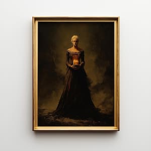 May include: A framed painting depicts a woman in a dark gown holding a lit candle. The artwork has a vintage aesthetic with a gold frame. The woman has blonde hair and is centered in the frame, with a dark, blurred background.