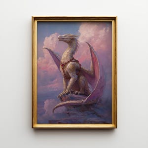 May include: A framed print of a white dragon with pink wings, perched on a rocky outcrop. The dragon is adorned with a red jeweled harness. The background features a cloudy sky with pink and purple hues. The frame is gold.