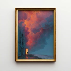 Puede incluir: Una impresión artística enmarcada que presenta un paisaje surrealista. Una persona está de pie en una puerta de un edificio, frente a un cielo vibrante de nubes naranjas y púrpuras. La obra de arte está enmarcada en un marco dorado.