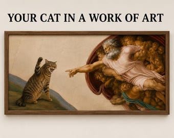 May include: A rectangular framed wall art print featuring a parody of The Creation of Adam, where a brown tabby cat reaches out to touch the finger of a bearded figure. The text YOUR CAT IN A WORK OF ART is printed in black above the wooden frame.
