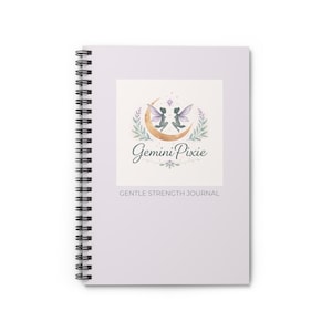 May include: A lavender spiral-bound journal. The cover displays a square design with the script "Gemini Pixie" and "GENTLE STRENGTH JOURNAL" below. The design includes two fairies, a crescent moon, and floral elements, all in soft colours.