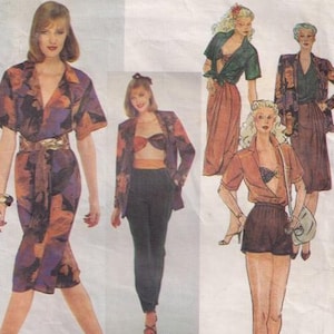 May include: Vintage Vogue American Designer sewing pattern for a women's outfit. The pattern is for a wrap dress, a cropped top, a pair of shorts, and a blazer. The pattern number is 2440. The pattern is by Anne Klein.