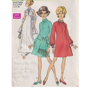 May include: Vintage Simplicity sewing pattern, number 8540, featuring three dress designs. The pattern includes a Miss Petite size 14MP with a bust size of 91 cm. The cover art showcases illustrations of the dresses in white, teal, and red.