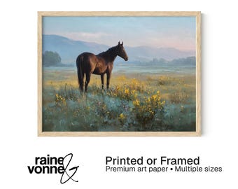 Puede incluir: Una impresión enmarcada de un caballo marrón en un campo de flores amarillas, con colinas y un cielo pastel en el fondo. El tamaño del marco es de 30,5 x 40,6 cm. El texto "Printed or Framed" es visible.
