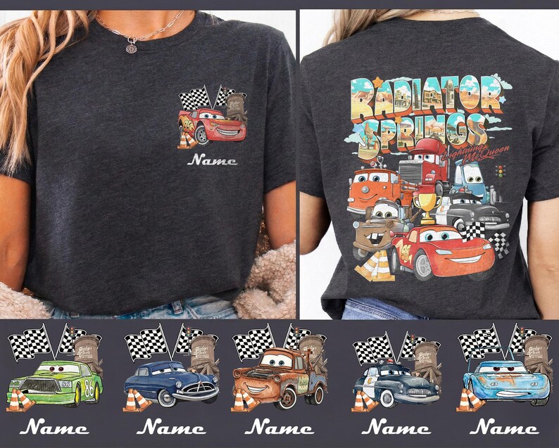May include: Dark gray t-shirt featuring a colorful graphic of characters from the movie Cars. The front of the shirt shows Lightning McQueen with the word "Name" below. The back of the shirt has the words "Radiator Springs" and more characters.