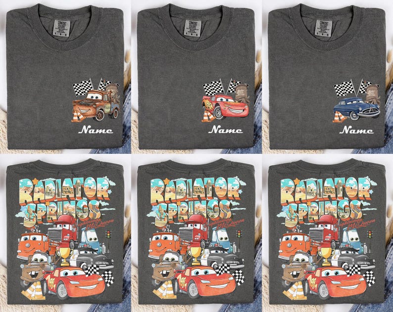 May include: Dark gray t-shirts featuring Cars movie characters. The shirts display images of Mater, Lightning McQueen, and other characters with the text "Name" below. The bottom row of shirts has a large "Radiator Springs" graphic.