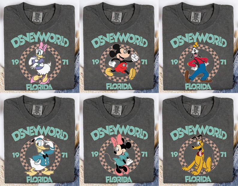 May include: Six gray t-shirts featuring Disney characters. Each shirt has the words "Disney World" in teal, the year "1971", and "Florida". The characters include Daisy Duck, Mickey Mouse, Goofy, Donald Duck, Minnie Mouse, and Pluto.