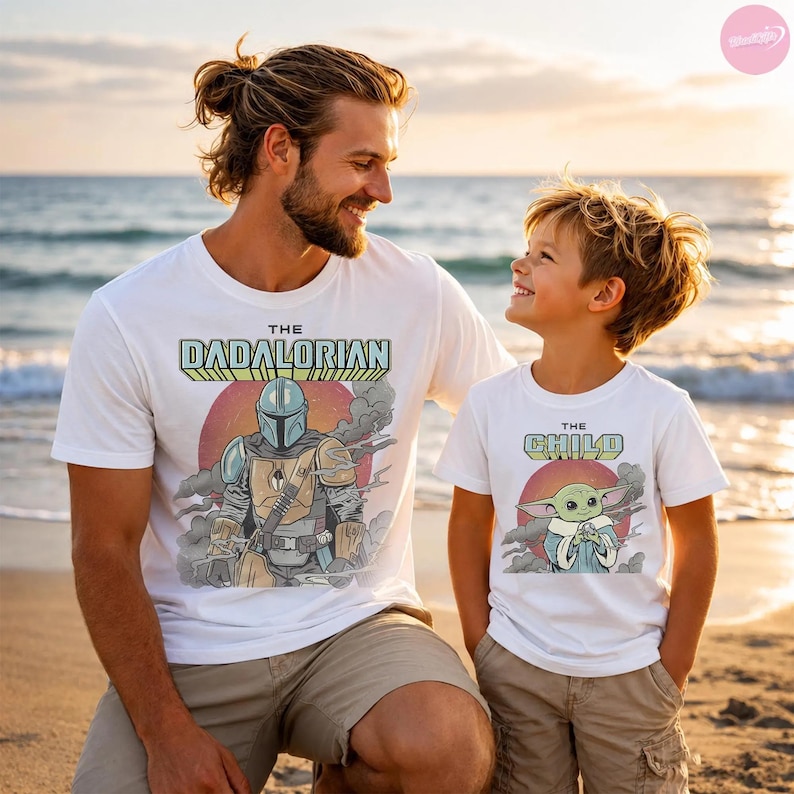 May include: Two white t-shirts with matching graphics. One shirt says "The Dadalorian" with a Mandalorian graphic, the other says "The Child" with a Baby Yoda graphic. Both shirts are worn by a father and son.