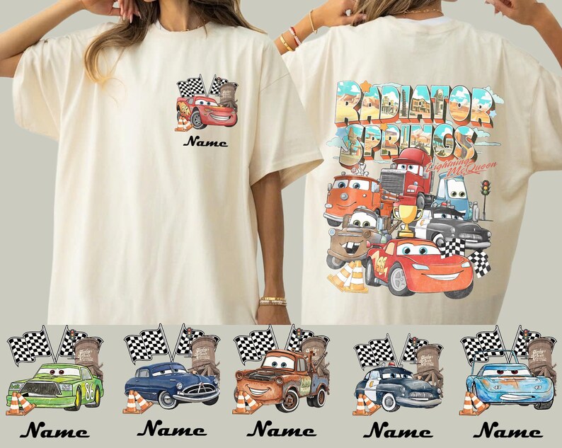 May include: Cream-colored t-shirt featuring a Cars movie design. The front displays Lightning McQueen with flags and the word "Name". The back showcases a colorful "Radiator Springs" graphic with various Cars characters. Below are five car designs with the word "Name".