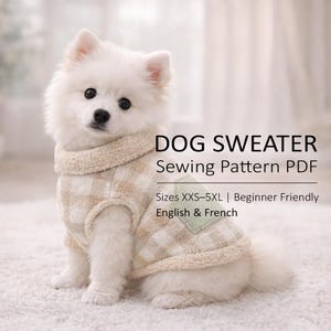 May include: A white ceramic mug with a black handle and the text "But First, Coffee" in a bold, black font. The mug is set against a blurred background, suggesting a cozy setting.