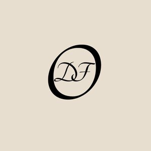 May include: A black graphic logo featuring the stylised capital letters DF intertwined within a bold black oval outline, set against a solid light beige background. The design uses a classic serif typeface for the letters, creating a clean visual.