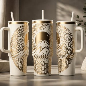 May include: Three white insulated tumblers with gold Japanese-inspired designs. Each tumbler features a handle, a straw, and a gold lid. The designs include Mount Fuji, cherry blossoms, and wave patterns. The tumblers are ideal for hot or cold beverages.