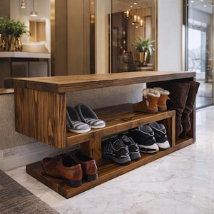 Peut inclure: Un meuble à chaussures en bois à trois niveaux, teinté d'une teinte marron chaude. Le meuble contient diverses chaussures, notamment des baskets, des bottes et des mocassins. Le design est simple et fonctionnel.