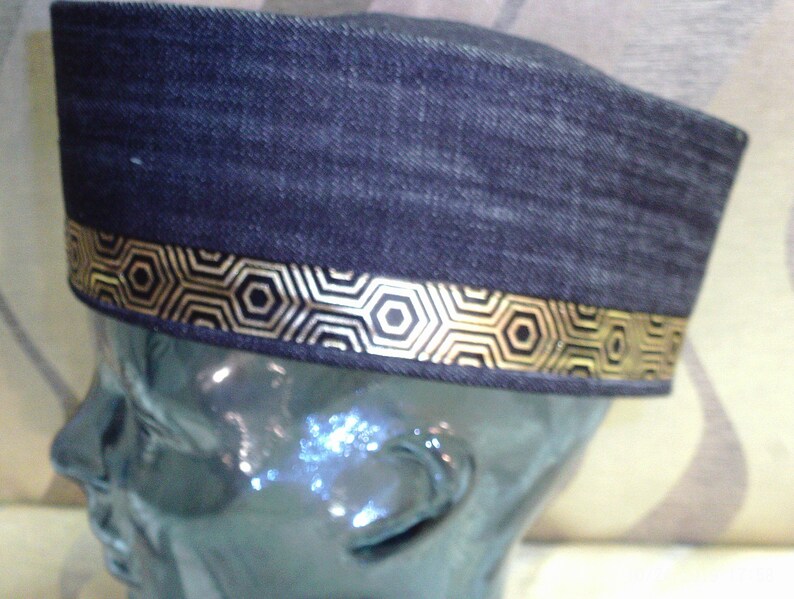 Completely Handmade from Black Denim this crown is custom designed the a Gold Egypt Ankh front and Center and completed with gold ribbon.