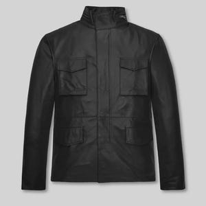 May include: A black leather jacket with a high collar and four front pockets. The jacket has a classic design, suitable for various occasions. The jacket is made of a smooth, durable material.