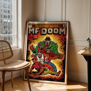 May include: A framed comic book art print with the text "MF DOOM" and "The Ultimate Villain." The artwork shows a group of stylized figures in vibrant colours, including red, green, and yellow, against a fiery background.