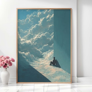 Könnte beinhalten: Gerahmter Kunstdruck mit einer surrealen Landschaft mit einer Person im Schatten. Das Kunstwerk zeigt einen Himmel voller flauschiger Wolken und eine hellblaue Wand. Der Rahmen ist hellbraun.