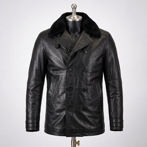 May include: A black leather double-breasted jacket featuring a wide black faux fur collar, long sleeves with triple-stitched cuffs, and six black buttons arranged in two vertical rows on the front, displayed on a mannequin torso.