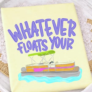 May include: A light yellow canvas print featuring the phrase "WHATEVER FLOATS YOUR" in purple. Below the text is a cartoon illustration of a pontoon boat with orange, pink, and green details, set on blue water.
