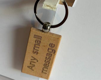 Anpassade lasergraverade nyckelringar