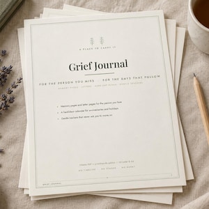 May include: A stack of white paper sheets featuring the title Grief Journal in black text. The header reads A Place to Carry It, followed by For the Person You Miss and For the Days That Follow. It includes bullet points for memory pages, a hard-days calendar, and gentle trackers.
