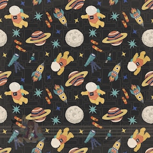 May include: A repeating pattern featuring astronauts, planets, rockets, telescopes, and stars in shades of orange, yellow, blue, and white on a dark gray background. The design has a whimsical, space-themed aesthetic.