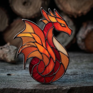 May include: A stained glass dragon sculpture in shades of red, orange, and yellow. The dragon has detailed wings and a curled tail. The glass pieces are outlined with a dark metal frame, creating a mosaic effect. The dragon is displayed on a weathered wooden surface.