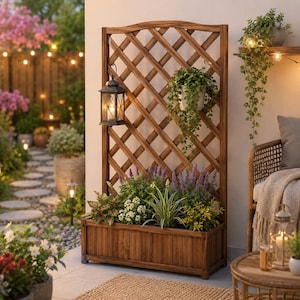 May include: A wooden trellis with a built-in planter box filled with various plants and flowers. A decorative lantern hangs from the trellis. The trellis is set against a backdrop of a garden with string lights and other potted plants.