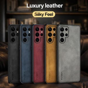 May include: A collection of five leather phone cases in various colors: black, navy blue, burgundy, mustard yellow, and gray. The cases feature multiple camera cutouts and the text "PANOYA". The top of the image reads "Luxury leather" and "Silky Feel".