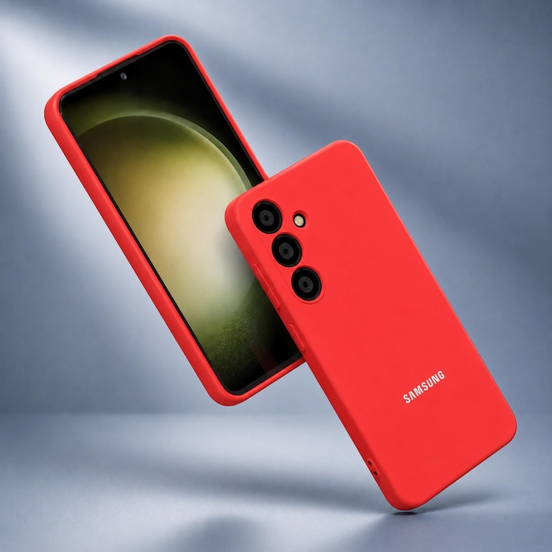 May include: Red phone case and phone with a black screen. The phone case has three camera lenses and the word "SAMSUNG" printed on the side. The phone is in the case, and the case is a solid red color.
