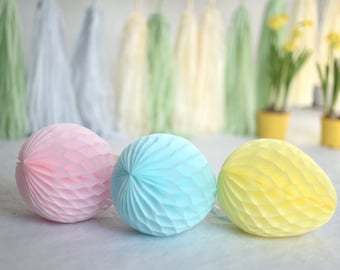 Xbessc 14 Uova Di Pasqua Decorative In Carta A Nido D'Ape, 7 Colori, Da Appendere Con Corda, Per Decorazioni Interne Ed Esterne