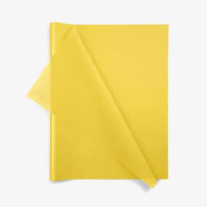 May include: A stack of rectangular yellow tissue paper sheets. The top sheet is partially folded over, revealing the thin, semi-translucent texture of the material. The paper has a smooth, matte finish and a vibrant, solid yellow color throughout.