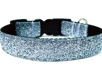 May include: A silver glitter dog collar with a black adjustable buckle.