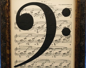 Bass Clef Music Note Art Print on Antique Music Book Page