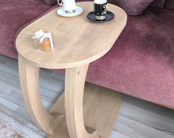 Ovale salontafel saffier-eiken C, moderne, verplaatsbare bijzettafel op wielen. Handgemaakte meubels.