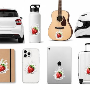 May include: A collection of stickers featuring a vibrant red strawberry with green leaves and white splash details. The stickers are applied to various items, including a car, water bottle, guitar, helmet, notebook, phone, tablet, and suitcase.