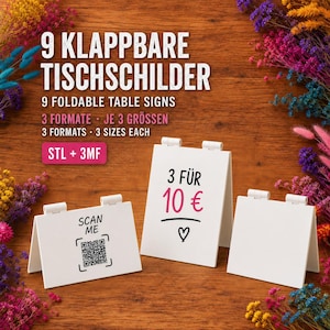 May include: Nine white foldable table signs with hinges. The text reads 9 KLAPPBARE TISCHSCHILDER, 9 FOLDABLE TABLE SIGNS, 3 FORMATE, JE 3 GRÖSSEN, 3 FORMATS, 3 SIZES EACH, STL + 3MF. One sign shows a QR code with SCAN ME, another says 3 FÜR 10 € with a heart.