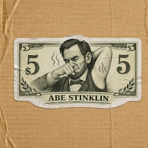 May include: A rectangular sticker featuring a parody of a five-dollar bill. The illustration depicts Abraham Lincoln holding his nose while sniffing his own armpit, with wavy lines indicating odor. The text ABE STINKLIN is printed at the bottom.