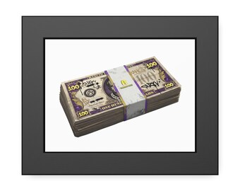 May include: A framed print featuring a stack of stylized $100 bills. The bills have a purple and gold color scheme with graffiti-style text and imagery. A white and purple band wraps around the stack, with the text "ARS".