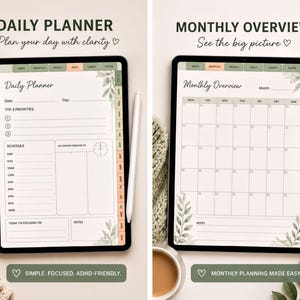 two planners, a daily planner and a monthly overview planner, both with a white background and green accents. The planners are placed on a table with a cup of coffee and a plant.