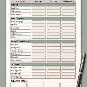 The image is a printed Monthly Budget form with a pen resting on top of it. The form includes various sections for tracking income, expenses, and savings, as well as a section for comparing the budget to the actual spending.