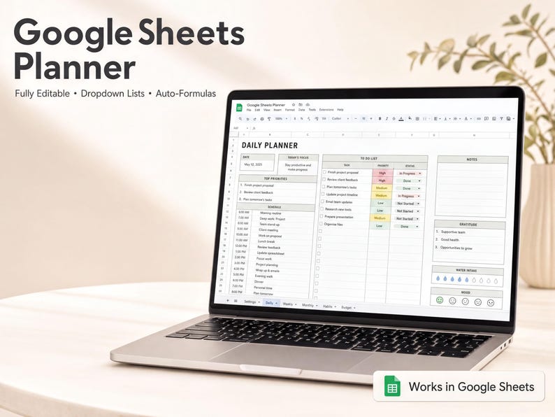 a laptop with a Google Sheets planner open on its screen. The laptop is placed on a table, and there is a plant in the background. The image does not contain any text, and it does not depict a collage of multiple images. The focus is on the laptop and the Google Sheets planner displayed on its screen.