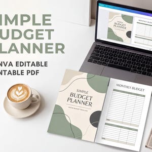 a laptop with a budget planner open, along with a cup of coffee and a notebook on a desk.