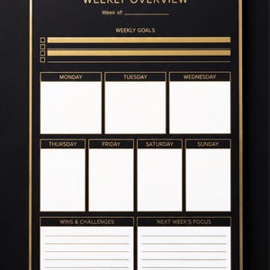 The image is a black and gold weekly overview board with a grid layout, displaying a weekly schedule and goals for each day of the week.