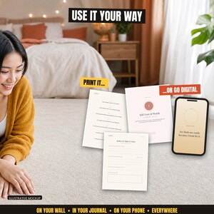 The image is an advertisement for a journaling app that encourages users to "USE IT YOUR WAY" and "PRINT IT...OR GO DIGITAL". The ad features a smiling woman sitting on the floor, surrounded by various items such as a potted plant, a book, and a smartphone. The text "ON YOUR WALL - IN YOUR JOURNAL - ON YOUR PHONE - EVERYWHERE" is displayed at the bottom, emphasizing the versatility of the app.