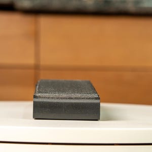 Close up of the high-performance PLA+ polyester composite build and pre-installed graphite tape for heat resistance.