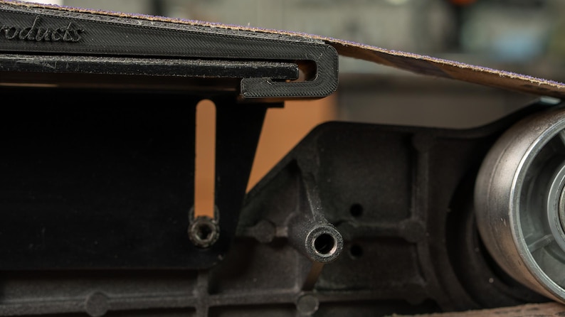 Side view showing the shallow 46 inch curve of the Rayzor Edge platen, ideal for thinning kitchen cutlery.