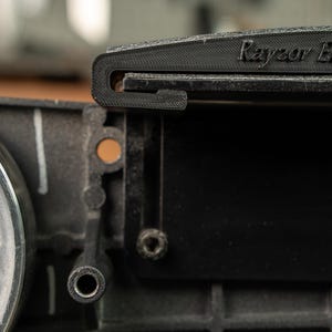 Close up of the high-performance PLA+ polyester composite build and pre-installed graphite tape for heat resistance.