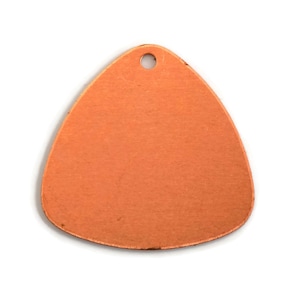 May include: A copper-colored, triangular tag with a small hole at the top for hanging. The tag has a smooth surface and rounded edges. The tag is blank and ready for customization. Ideal for jewelry making or crafting projects.