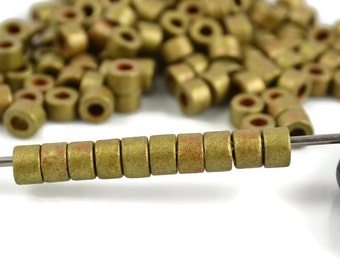 6mm Mini Tube, Antique Gold, Mykonos Ceramic Beads, Pkg 50 or 150